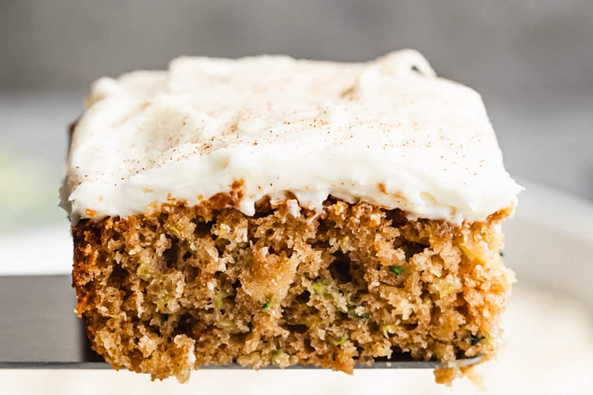 This zucchini cake is a moist, crowd-pleasing dessert that’s easy to make in a 9x13 pan for any gathering.
