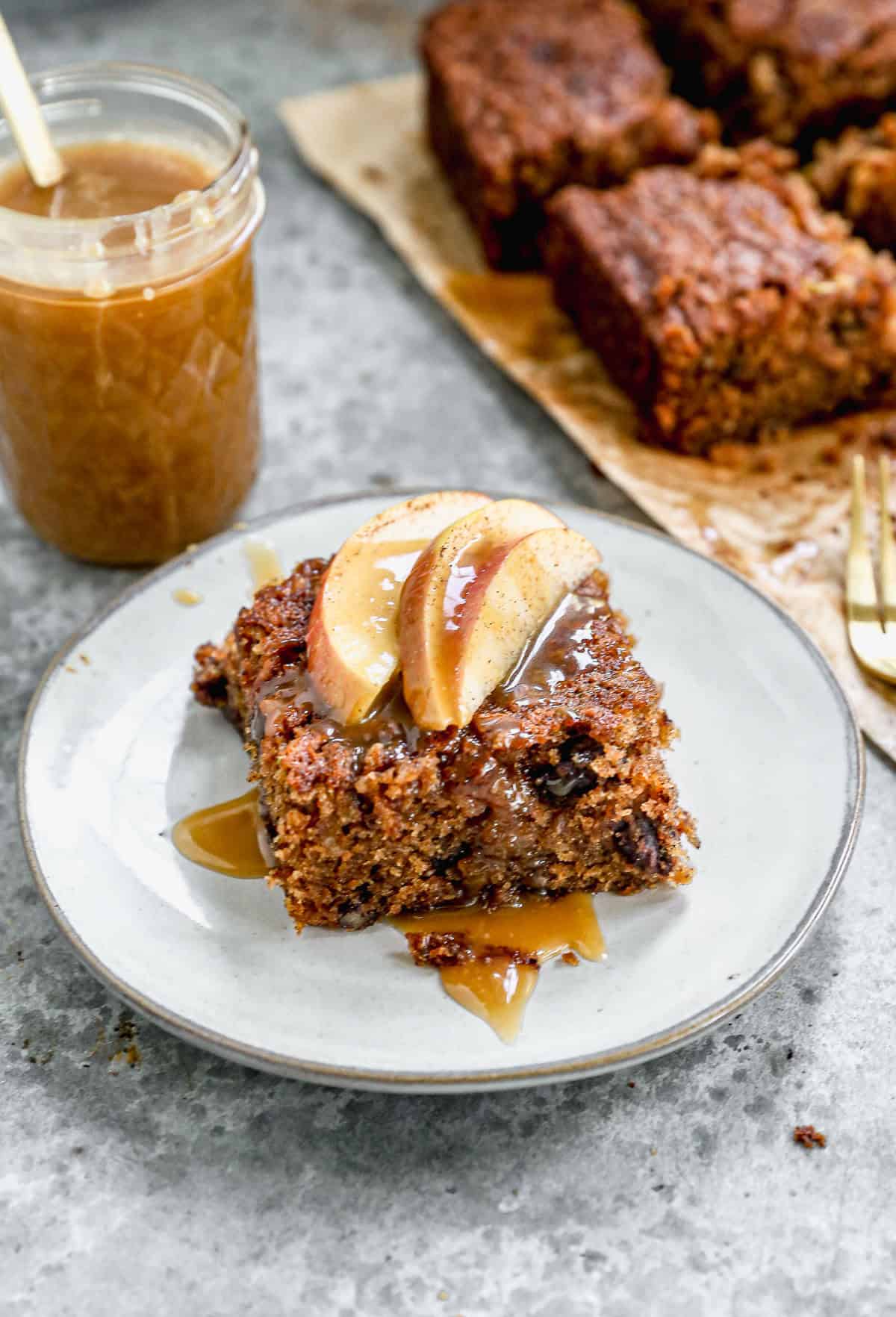 This Fresh Apple Cake is moist, warmly spiced, and topped with homemade caramel sauce for a cozy gathering.