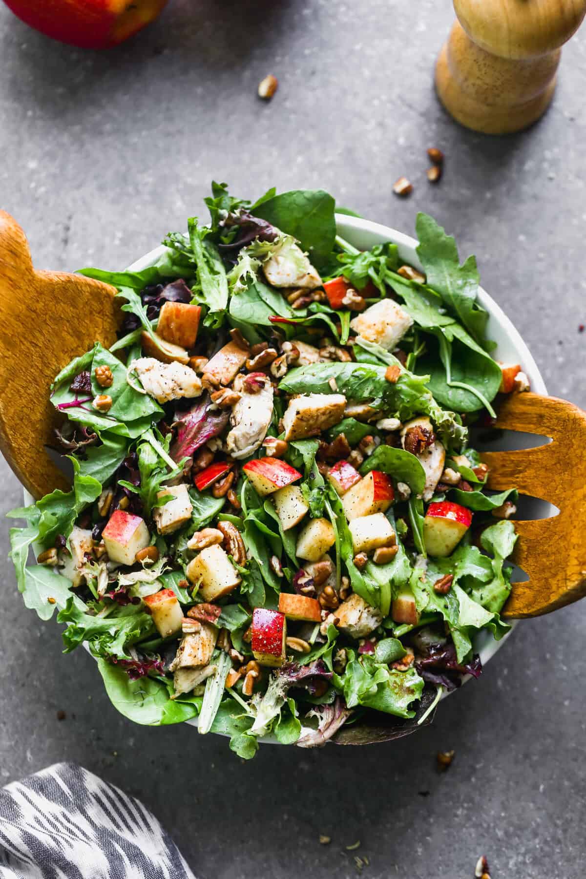 This Apple Pecan Salad combines sweet apples and crunchy pecans over greens for a crisp, autumn lunch or side.