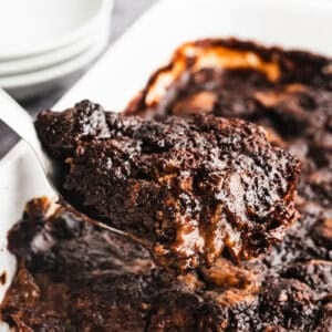 This easy Chocolate Pudding Cake recipe is moist, decadent, and has the most incredible warm chocolate pudding naturally baked in the chocolate cake. It's easy to make in just a few minutes with simple pantry ingredients!