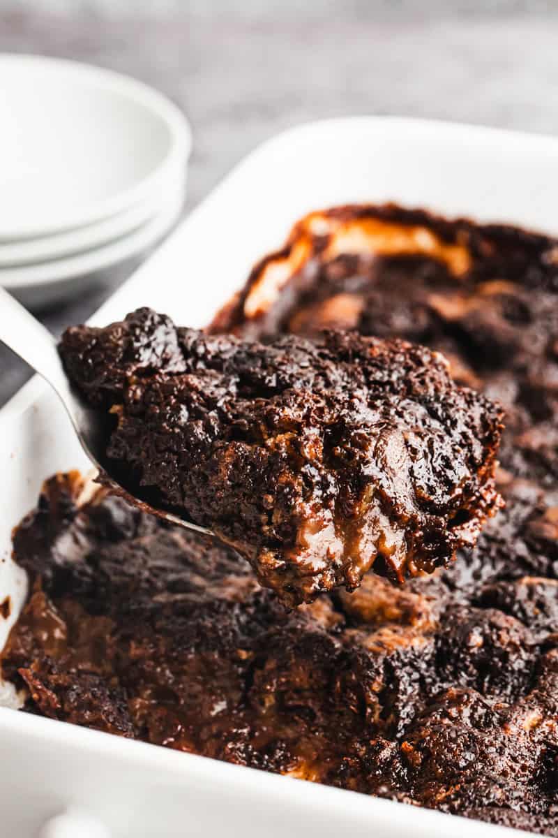 This easy Chocolate Pudding Cake recipe is moist, decadent, and has the most incredible warm chocolate pudding naturally baked in the chocolate cake. It's easy to make in just a few minutes with simple pantry ingredients!