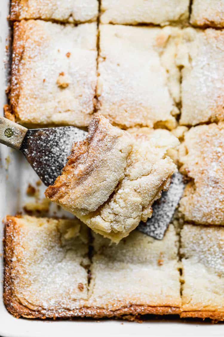Gooey Butter Cake is ultra-rich, easy to slice, and perfect for making ahead for a potluck or party.