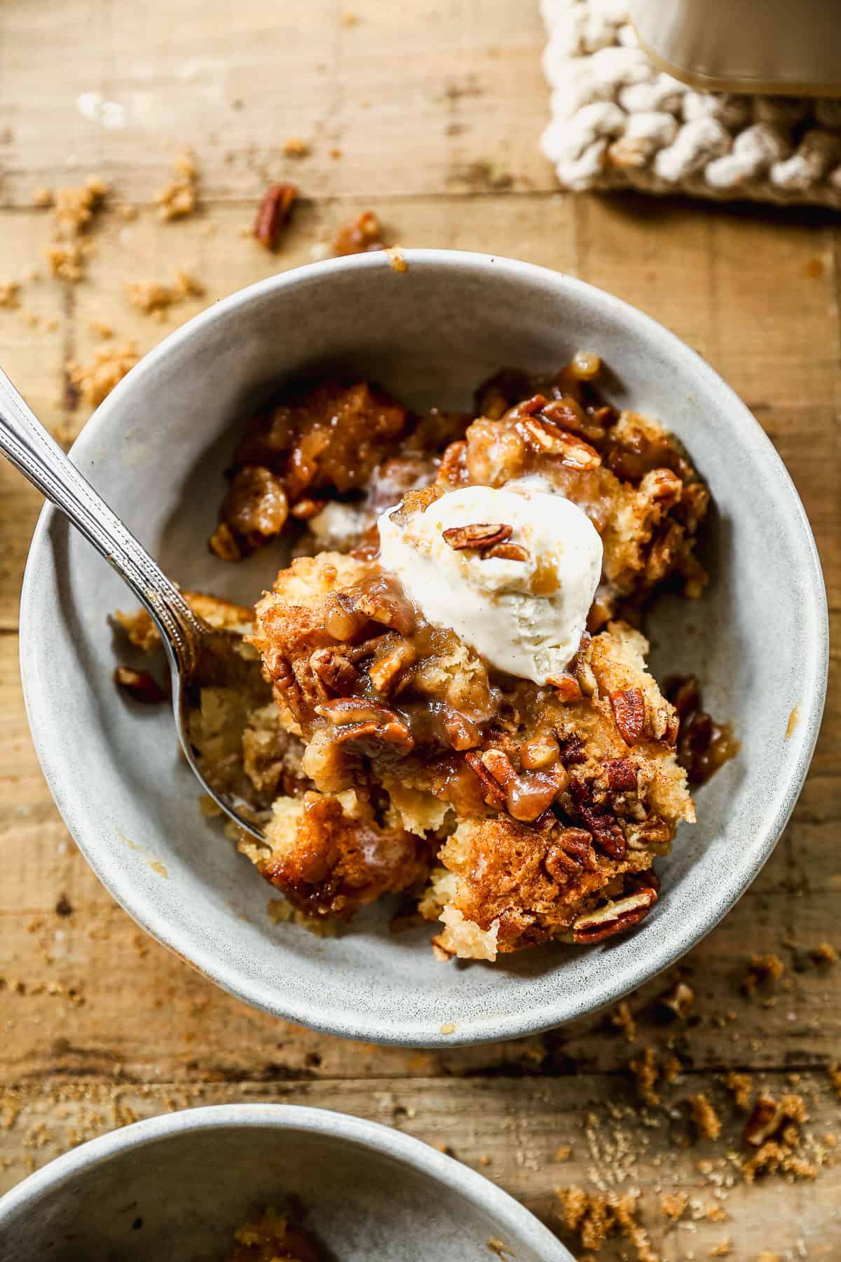 Pecan cobbler is a crowd-pleasing dessert that tastes like pie in a scoopable form.