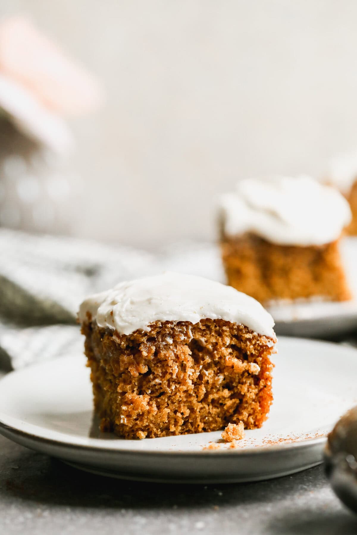 This pumpkin cake is an easy, crowd-pleasing dessert topped with cream cheese frosting and perfect for celebrating the flavors of fall.
