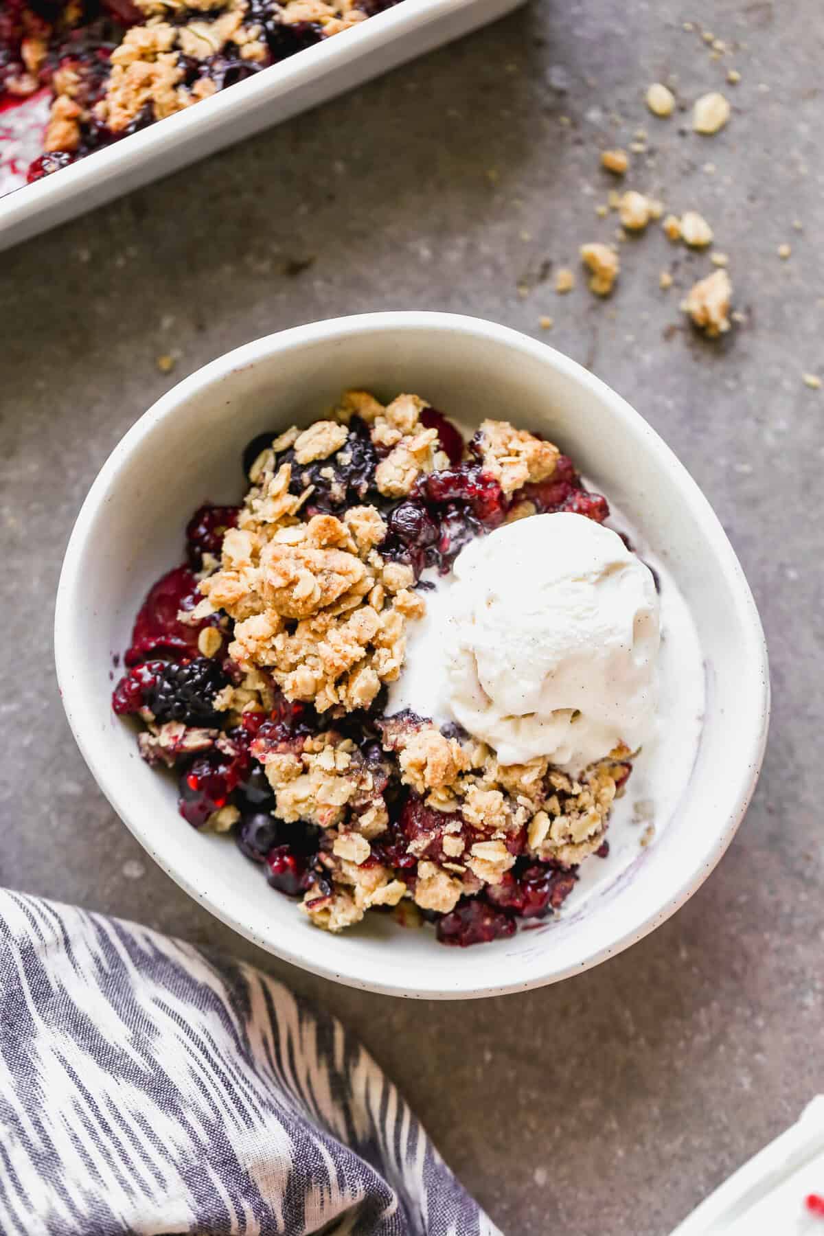 Triple Berry Crisp is the kind of easy dessert you can whip up with frozen fruit and enjoy warm with ice cream.