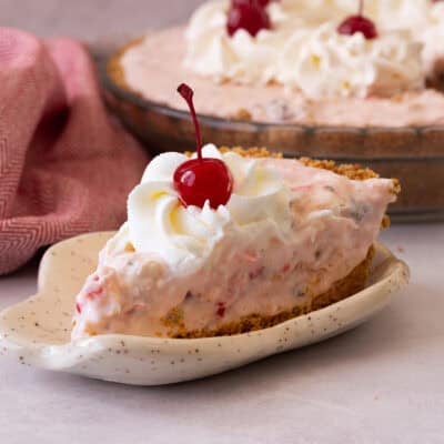 This old-fashioned Millionaire Pie recipe is creamy, flavorful, and filled with pecans, coconut, cherries, and pineapple.