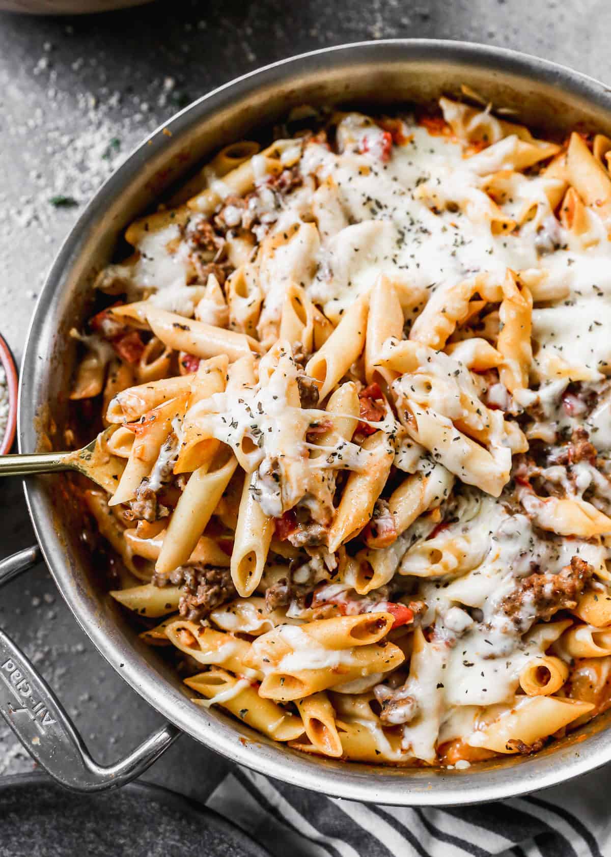 Baked Ziti is an easy one pot pasta bake that’s cheesy, saucy, and perfect for family dinners.