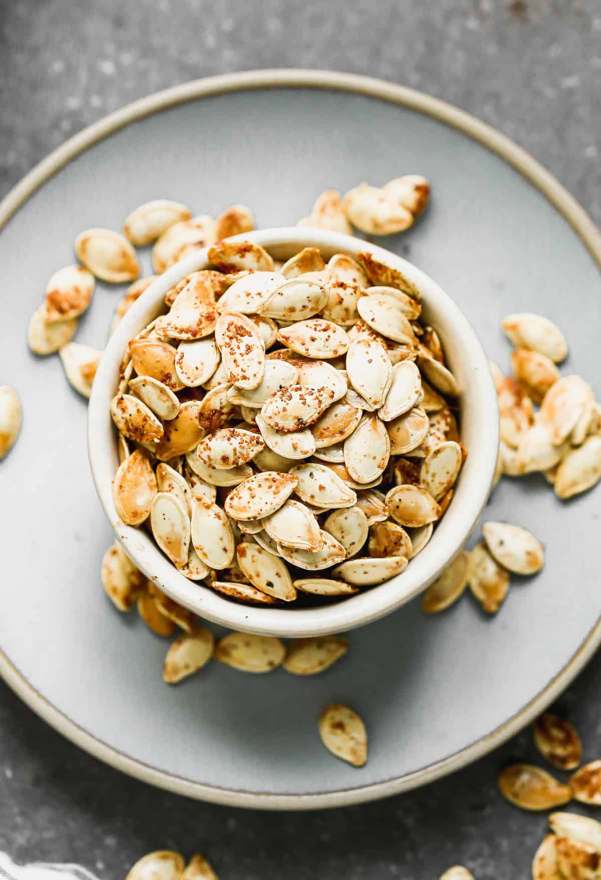 Roasted pumpkin seeds are the ultimate no-waste Halloween snack you can flavor any way you like.