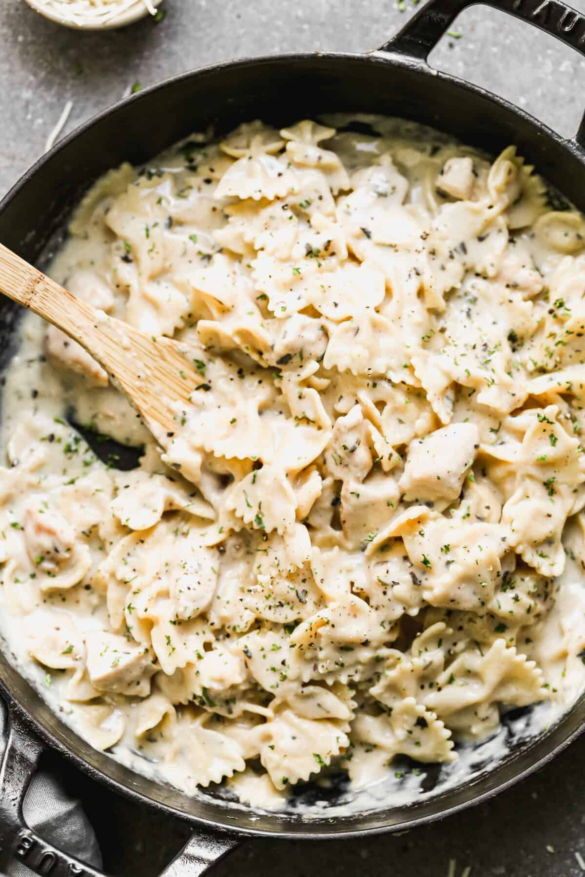 Skinny Chicken Alfredo is a lightened-up one pot dinner with all the creamy, cheesy flavor you crave.