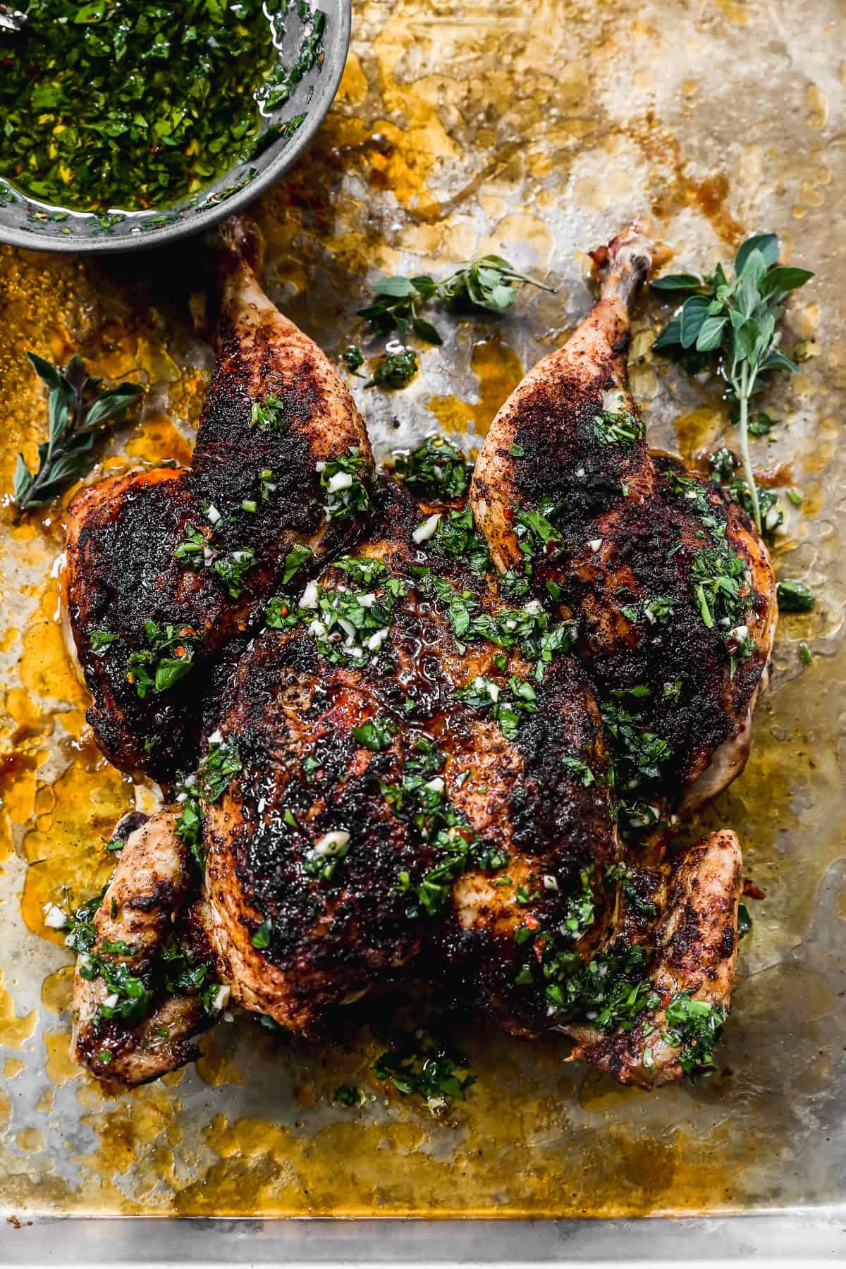 Spatchcock chicken is an easy, budget-friendly alternative to turkey that’s perfect for the holiday table.