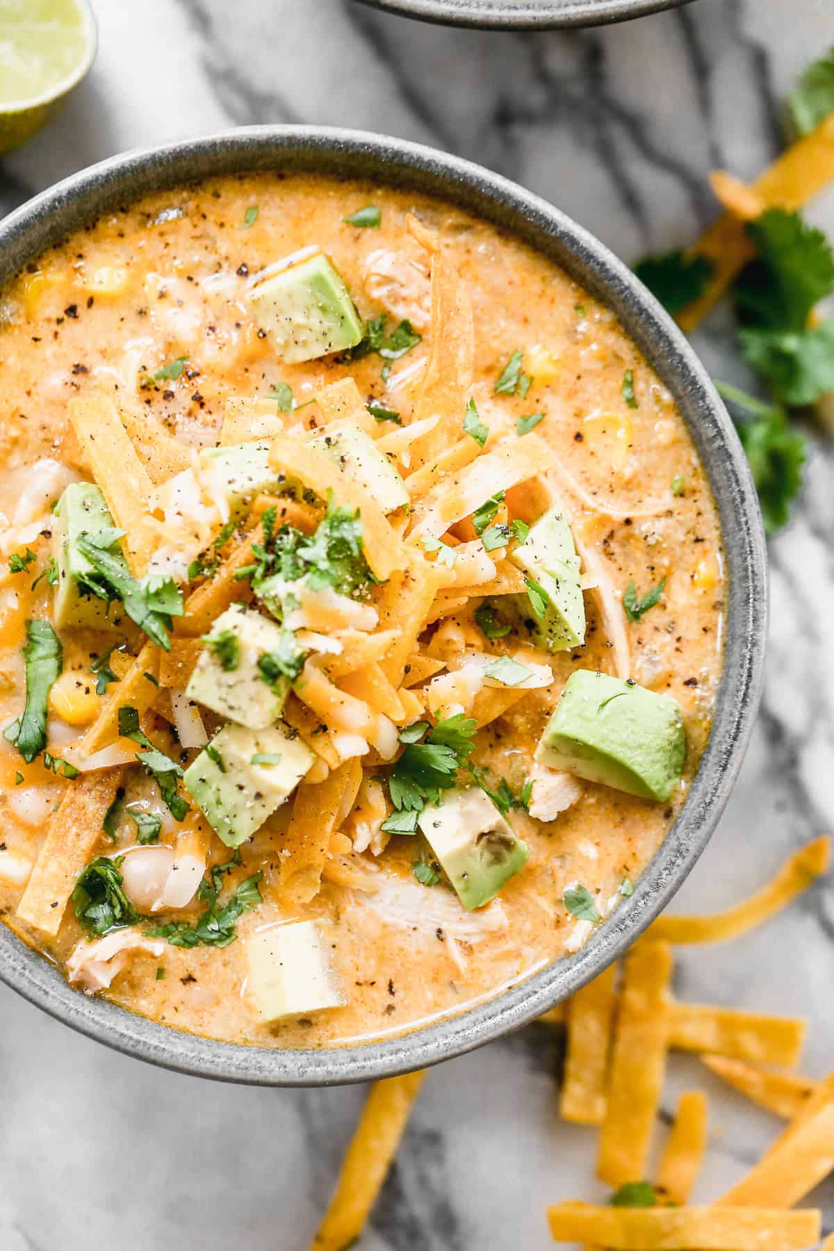 A cozy, creamy chili that’s light but filling- ideal for Fall weeknight dinners or cook-offs.