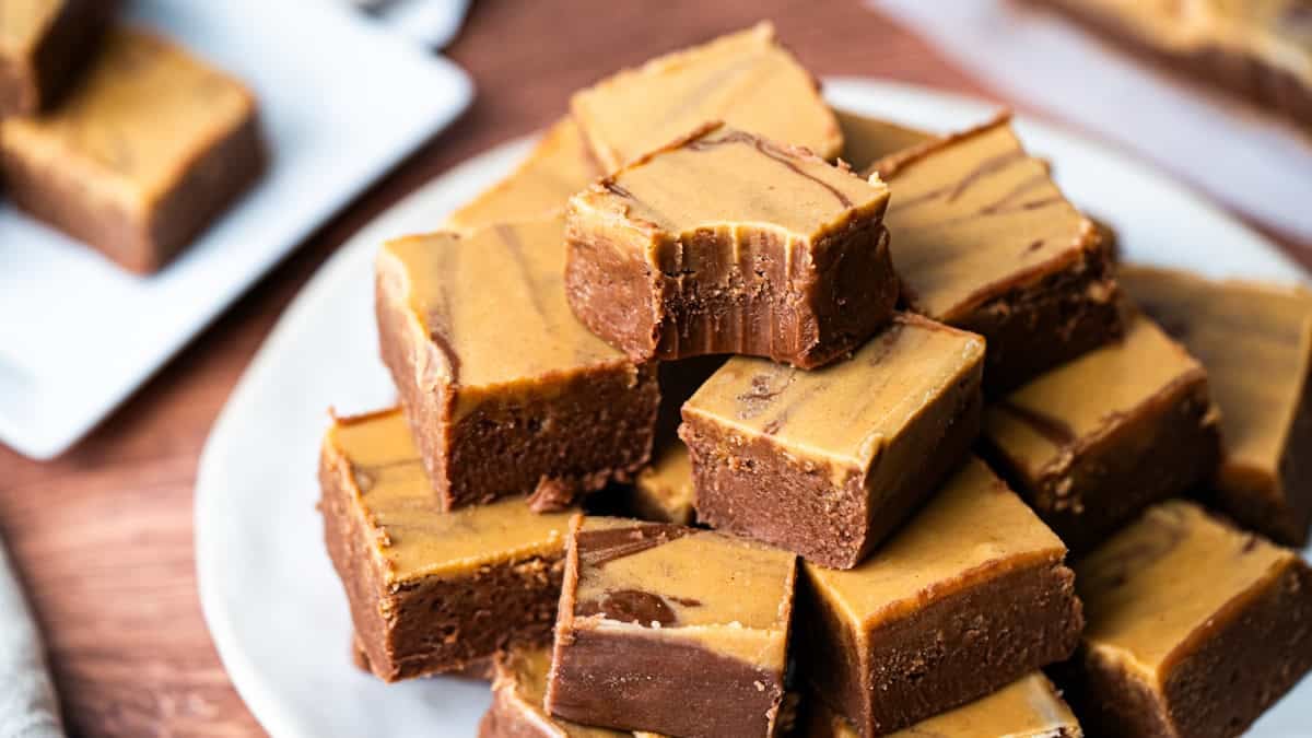 This easy Chocolate Peanut Butter Fudge recipe is made in just minutes with ingredients you already have. It's rich, creamy, and tastes like a creamy peanut butter cup!
