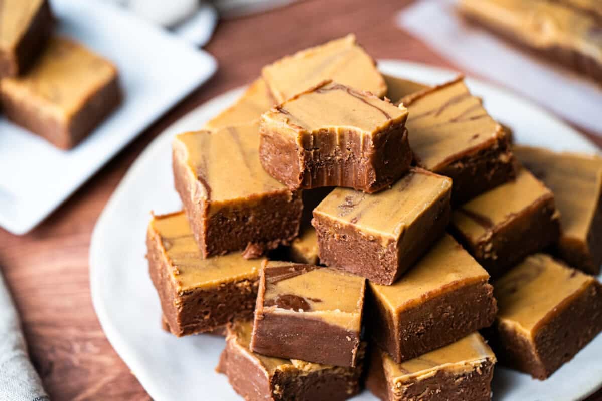 This easy Chocolate Peanut Butter Fudge recipe is made in just minutes with ingredients you already have. It's rich, creamy, and tastes like a creamy peanut butter cup!