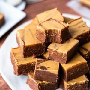 This easy Chocolate Peanut Butter Fudge recipe is made in just minutes with ingredients you already have. It's rich, creamy, and tastes like a creamy peanut butter cup!