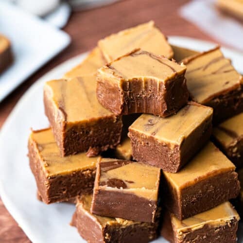 This easy Chocolate Peanut Butter Fudge recipe is made in just minutes with ingredients you already have. It's rich, creamy, and tastes like a creamy peanut butter cup!
