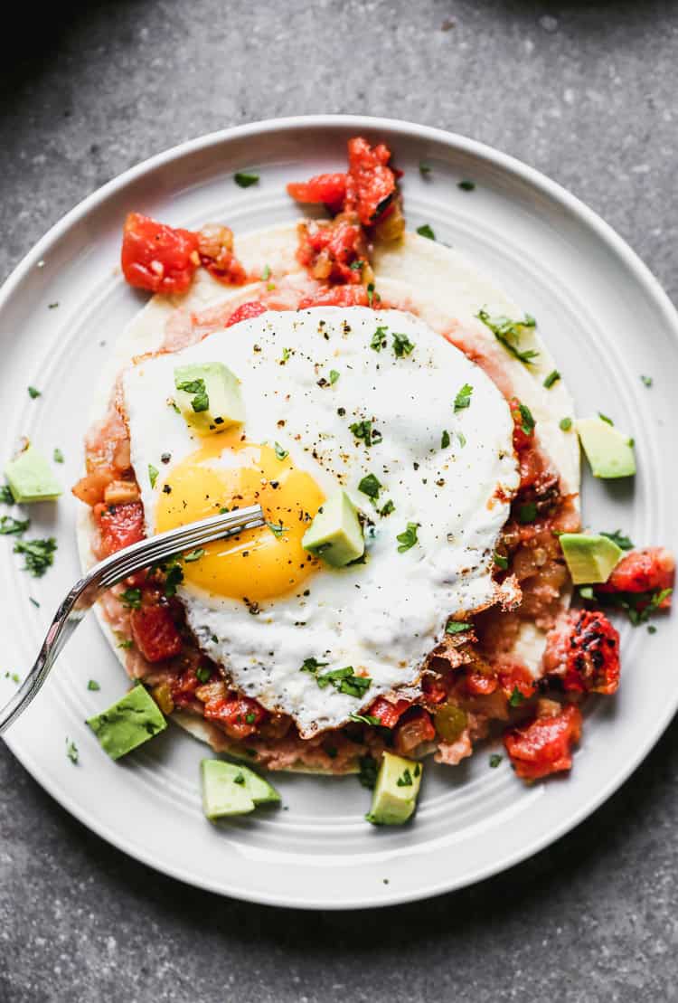 These huevos rancheros give you a quick, protein-packed meal that works for breakfast, dinner, or any busy weeknight.