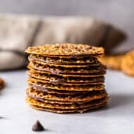 This easy Lace Cookies recipe has two delicate, crispy cookies sandwiching a melted chocolate layer. They are incredible!