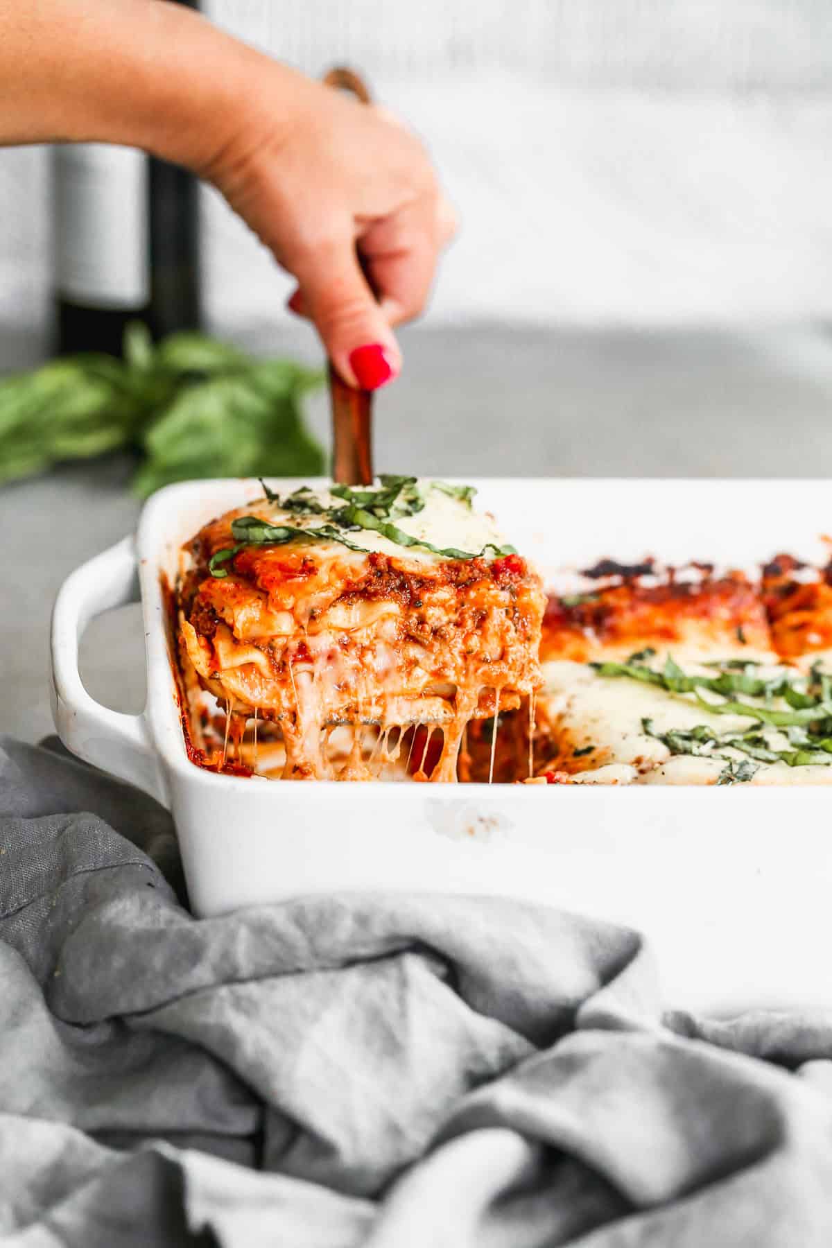 Homemade Lasagna is a comforting holiday main dish that feeds a crowd and always gets rave reviews.