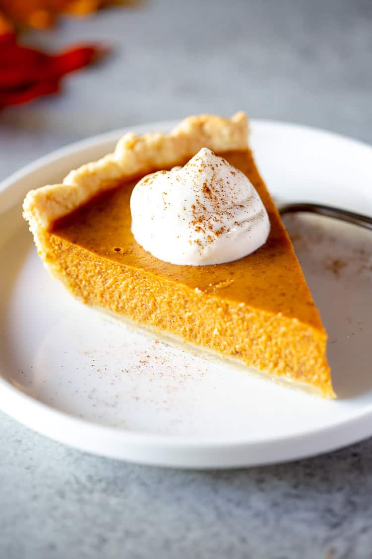 This traditional pumpkin pie recipe is the perfect make-ahead Thanksgiving dessert with its silky filling and buttery crust.
