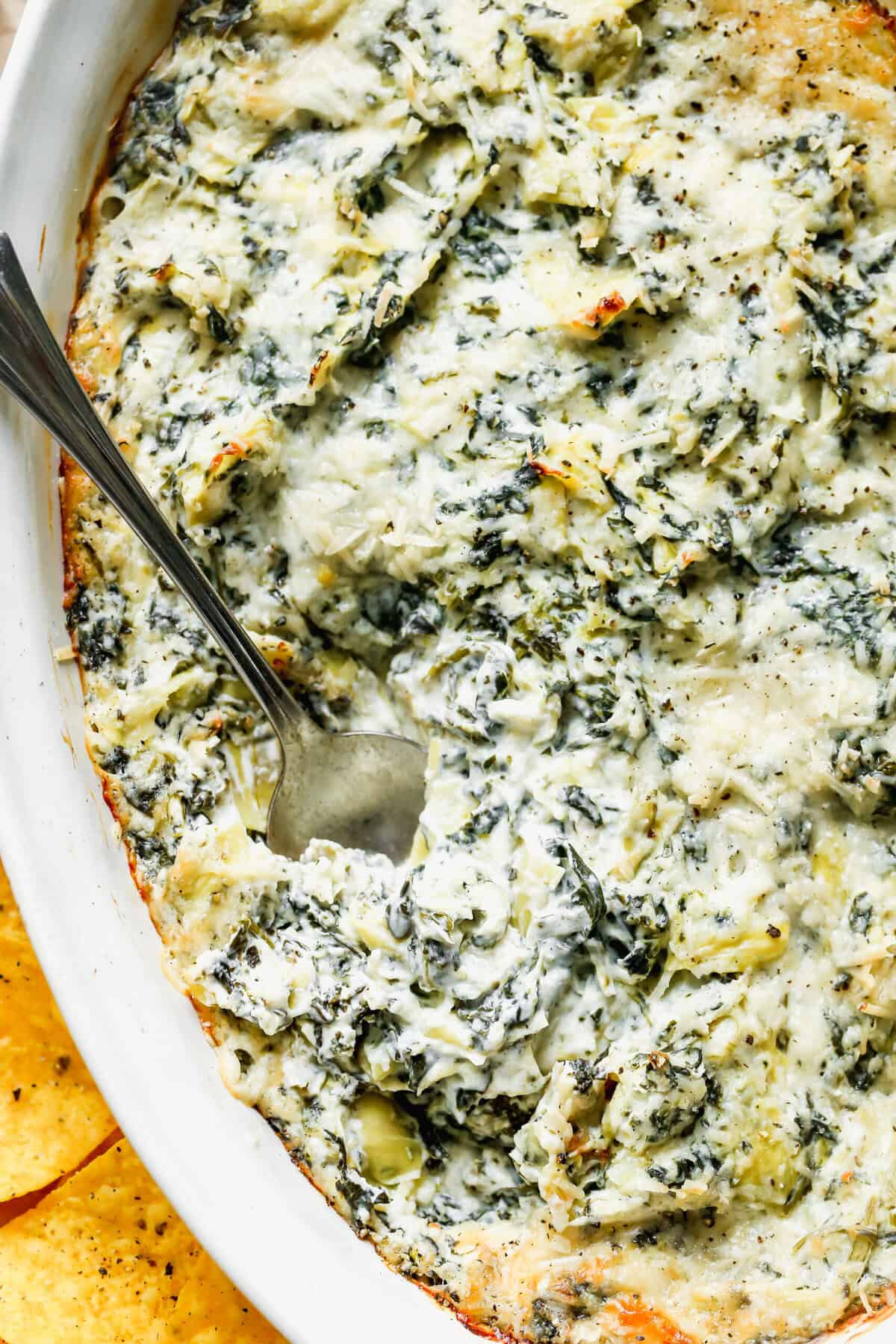 This spinach artichoke dip gives you a make-ahead appetizer that stays hot and inviting at your gathering.