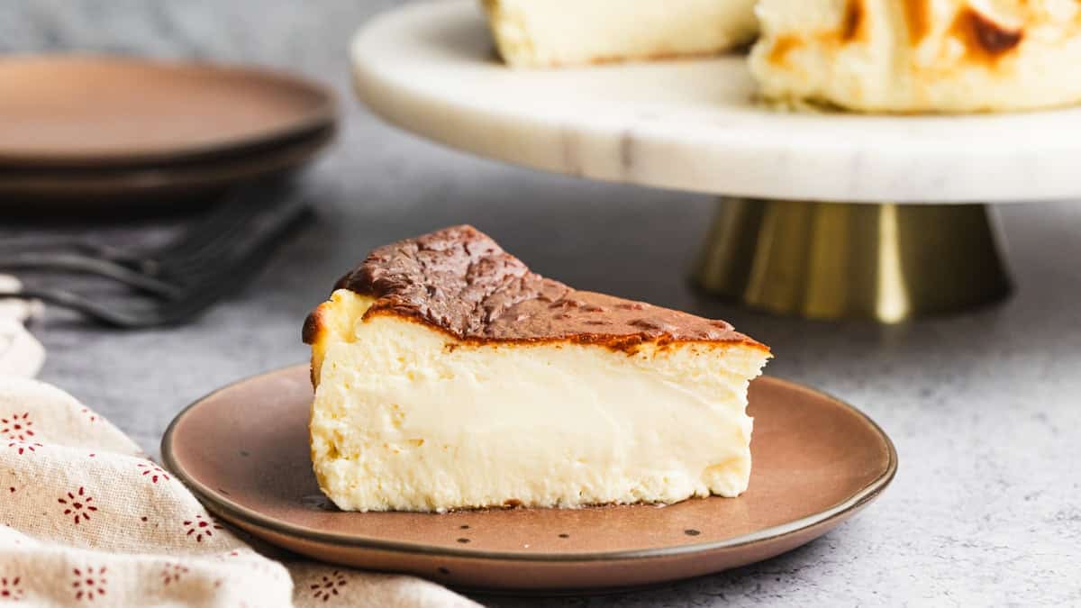 This easy Basque Cheesecake recipe is made without a water bath or crust and is so creamy and delicious. It's a rustic, yet elegant.
