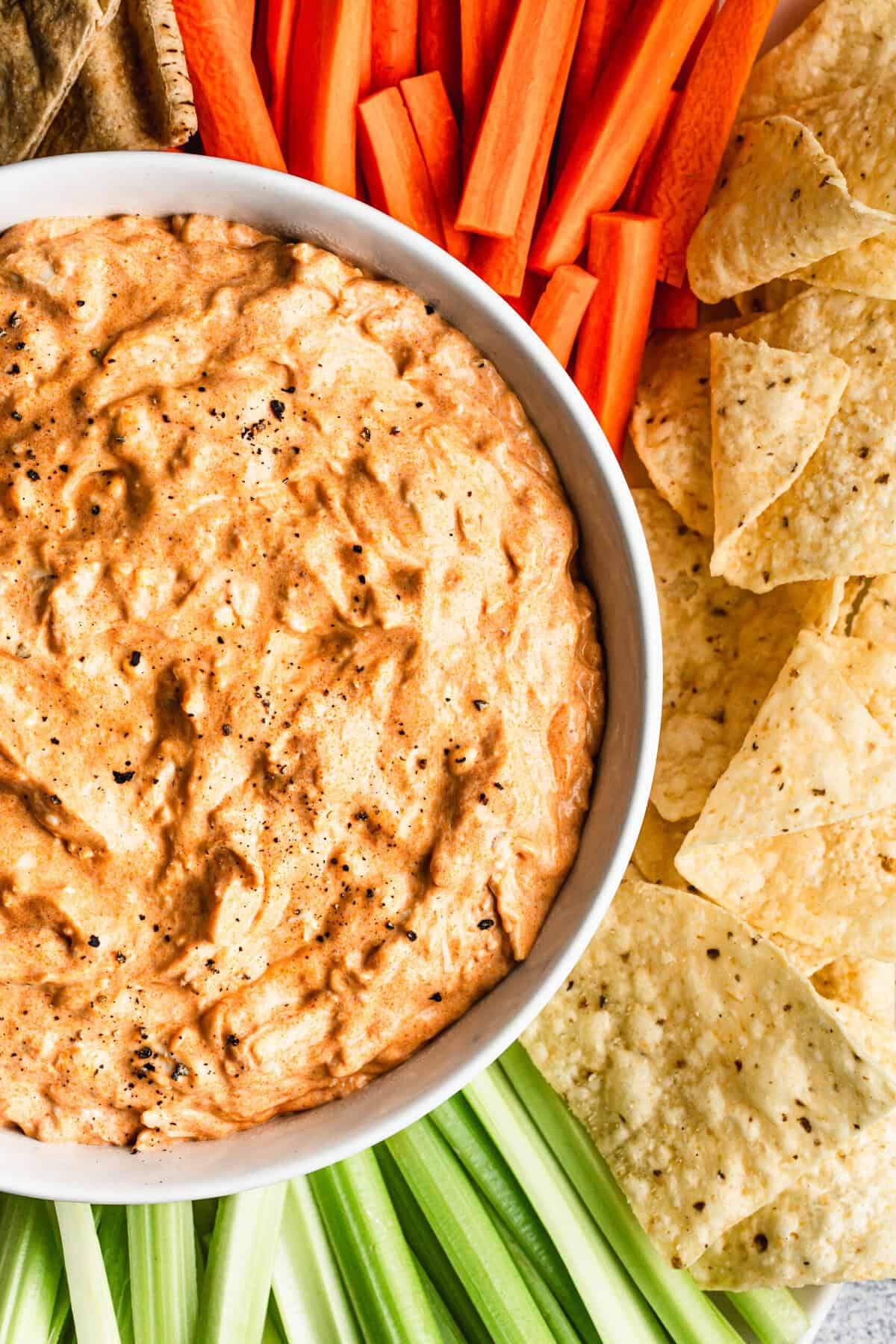 This Buffalo Chicken Dip brings spicy, creamy party flavor in minutes for holiday gatherings.
