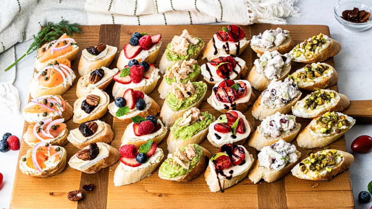 This easy Canapés recipe has a variety of options from smoked salad to pistachios and honey to caprese and chicken salad. They are easy, no bake appetizers everyone will love!