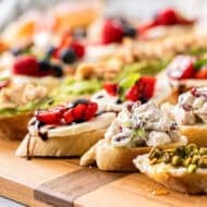 This easy Canapés recipe guide has a variety of base and topping options to create a board of canapés that are delicious and perfect for parties, holidays, or appetizers.