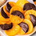 Candied Orange Slices are such a delicious treat that you can dip in chocolate or leave plain. They simmer in sugar and water then dry to develop that perfect sweet, chewy texture.