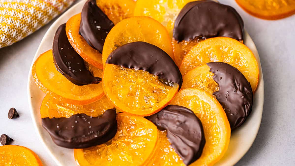 Candied Orange Slices are such a delicious treat that you can dip in chocolate or leave plain. They simmer in sugar and water then dry to develop that perfect sweet, chewy texture.