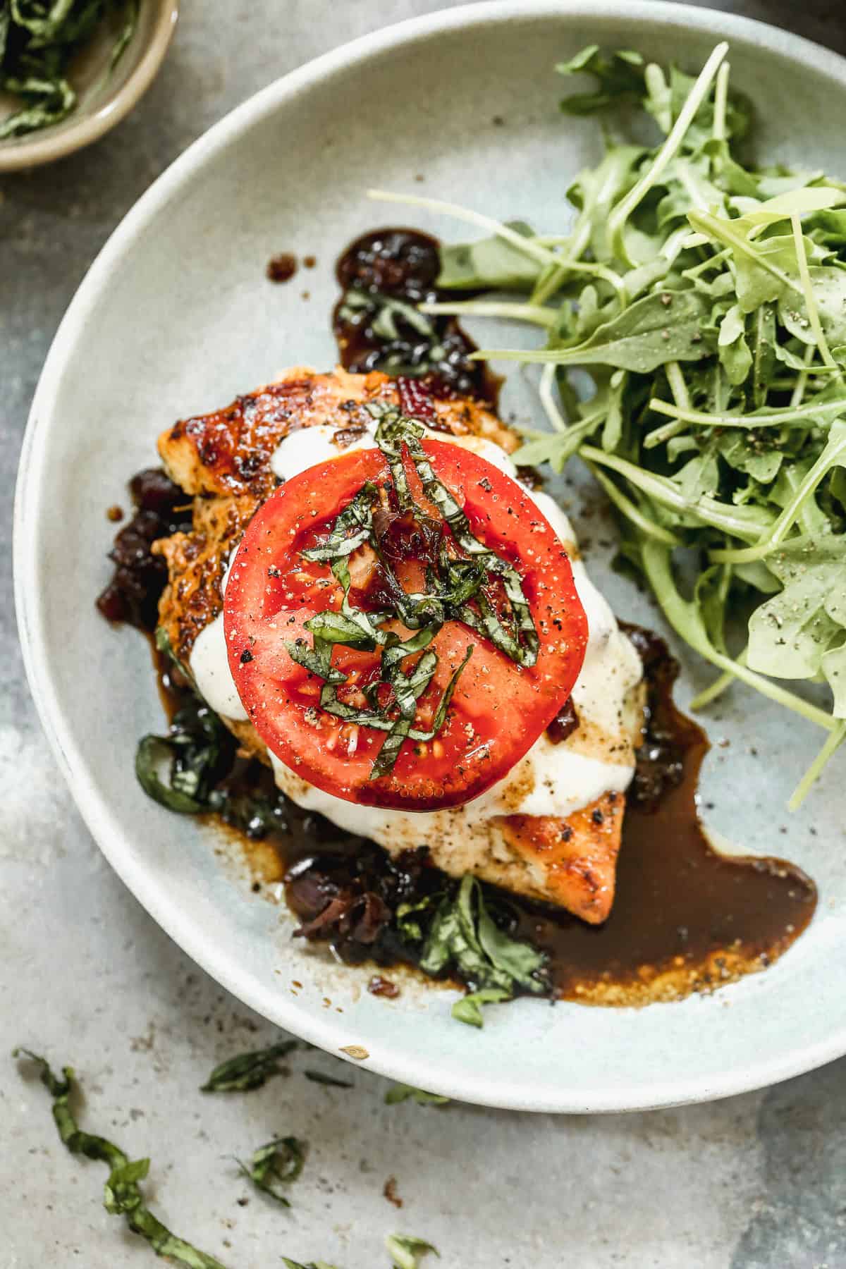 Chicken Caprese is a quick one-pan dinner with juicy chicken, mozzarella, and balsamic for a fresh and healthy meal.