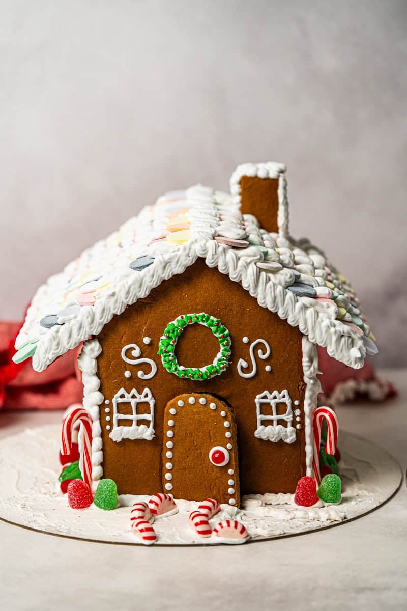 This homemade Gingerbread House recipe turns into a fun, edible holiday project the whole family can decorate together.
