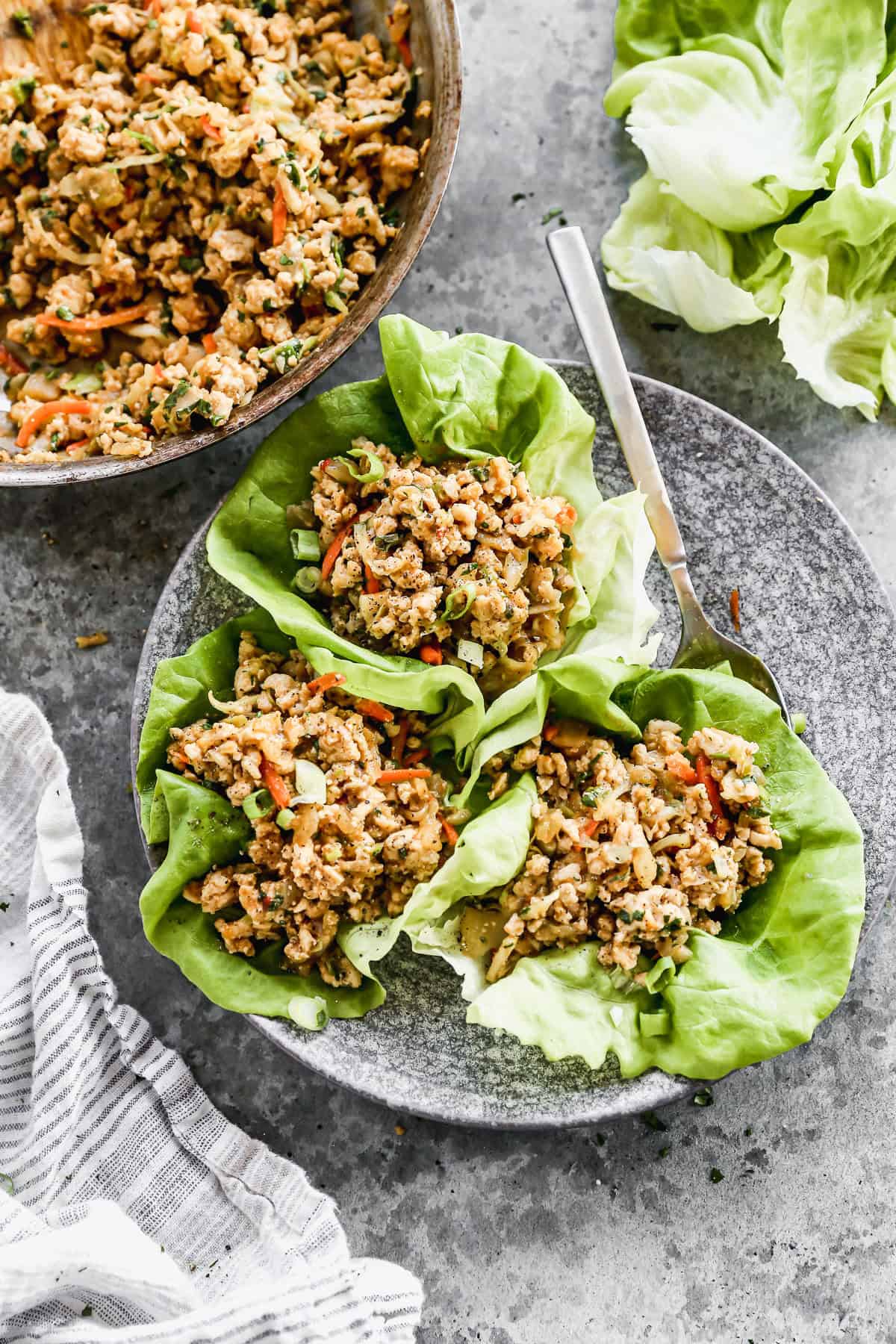 Thai Chicken Lettuce Wraps are a refreshing party dish that balances bold flavors with a light bite.