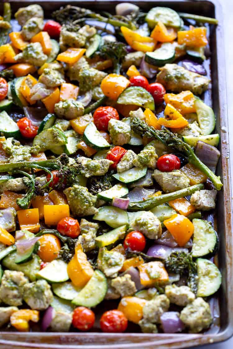 One Pan Pesto Chicken and Vegetables is a flavorful sheet pan dinner that makes healthy eating quick and easy.