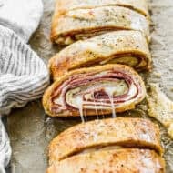 This cheesy stromboli is freezer-friendly and packed with leftover ham and melty mozzarella.