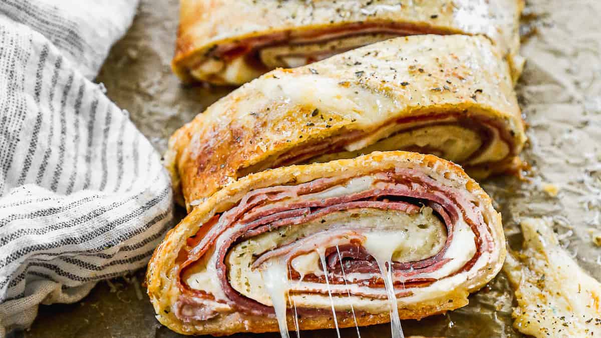 This cheesy stromboli is freezer-friendly and packed with leftover ham and melty mozzarella.