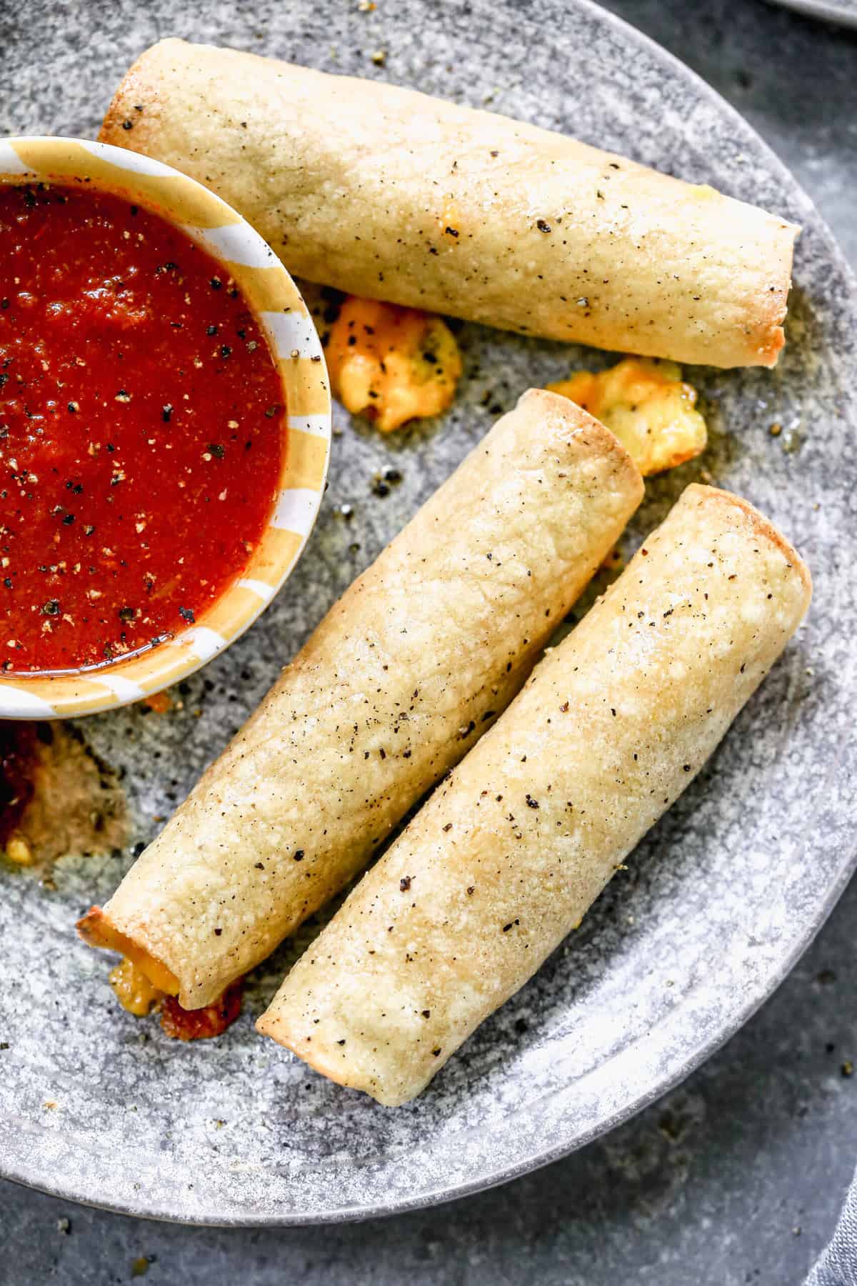 Breakfast Taquitos are crispy, make-ahead egg and sausage taquitos that reheat easily for busy school mornings.