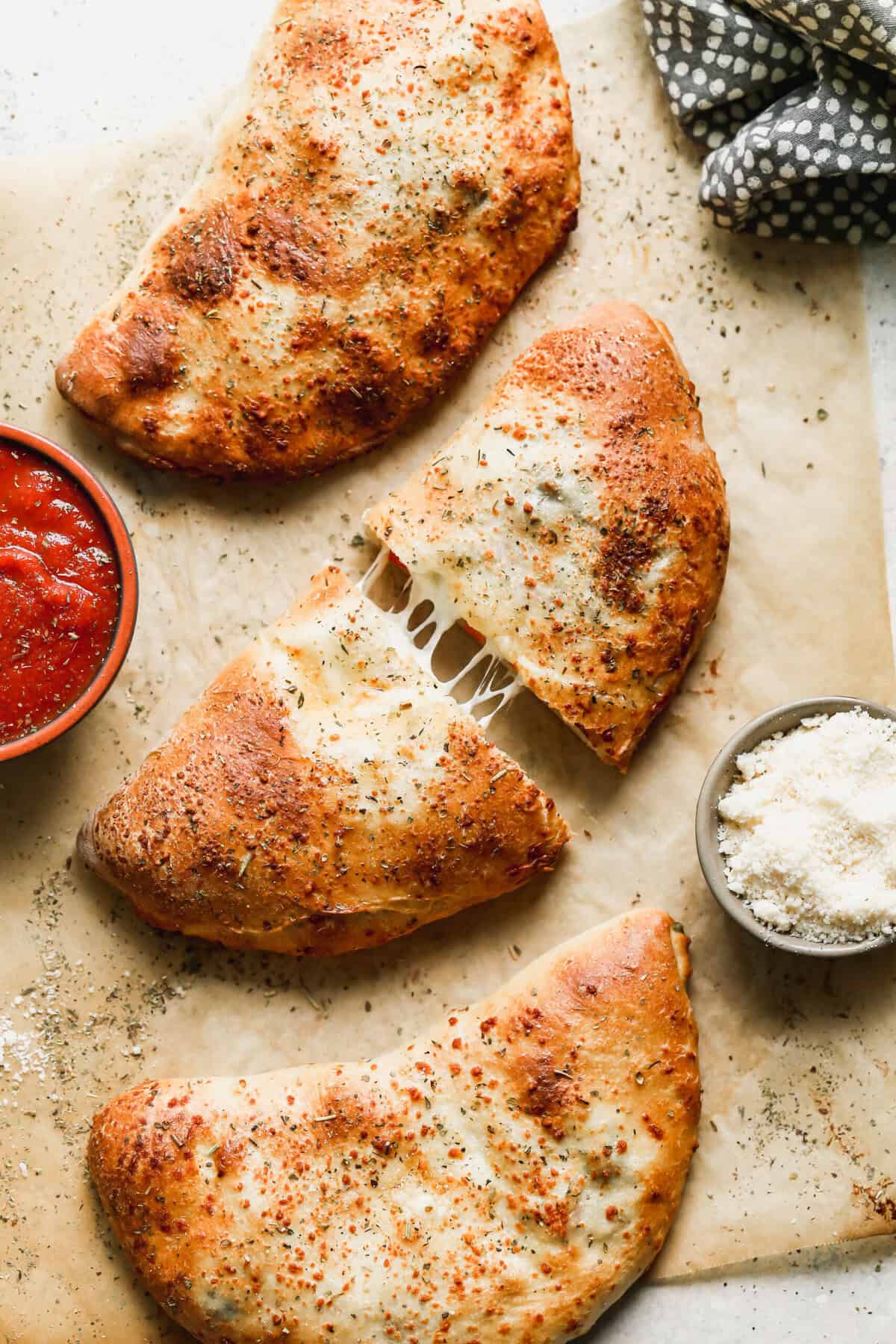 These calzones offer handheld vegetarian dinners that satisfy hearty appetites.