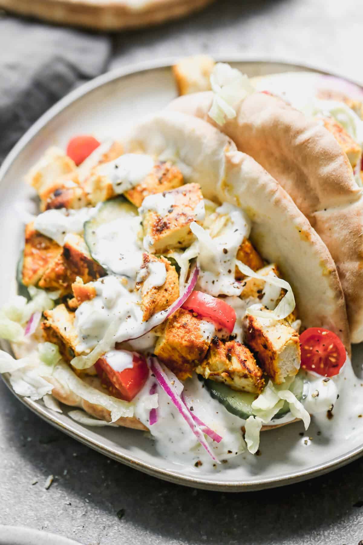 Chicken Gyros are a family-friendly dinner that makes picky-eater nights easier with simple toppings everyone can choose.