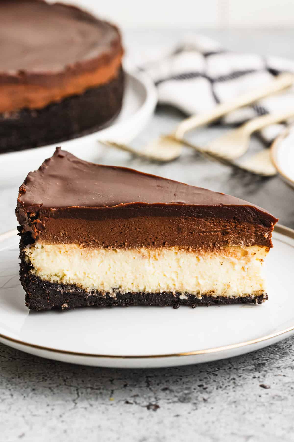 This chocolate mousse cheesecake combines velvety cheesecake with rich chocolate mousse for a decadent treat.