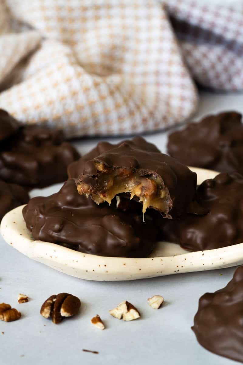 These chocolate turtles combine pecans, caramel, and chocolate for a quick homemade candy.