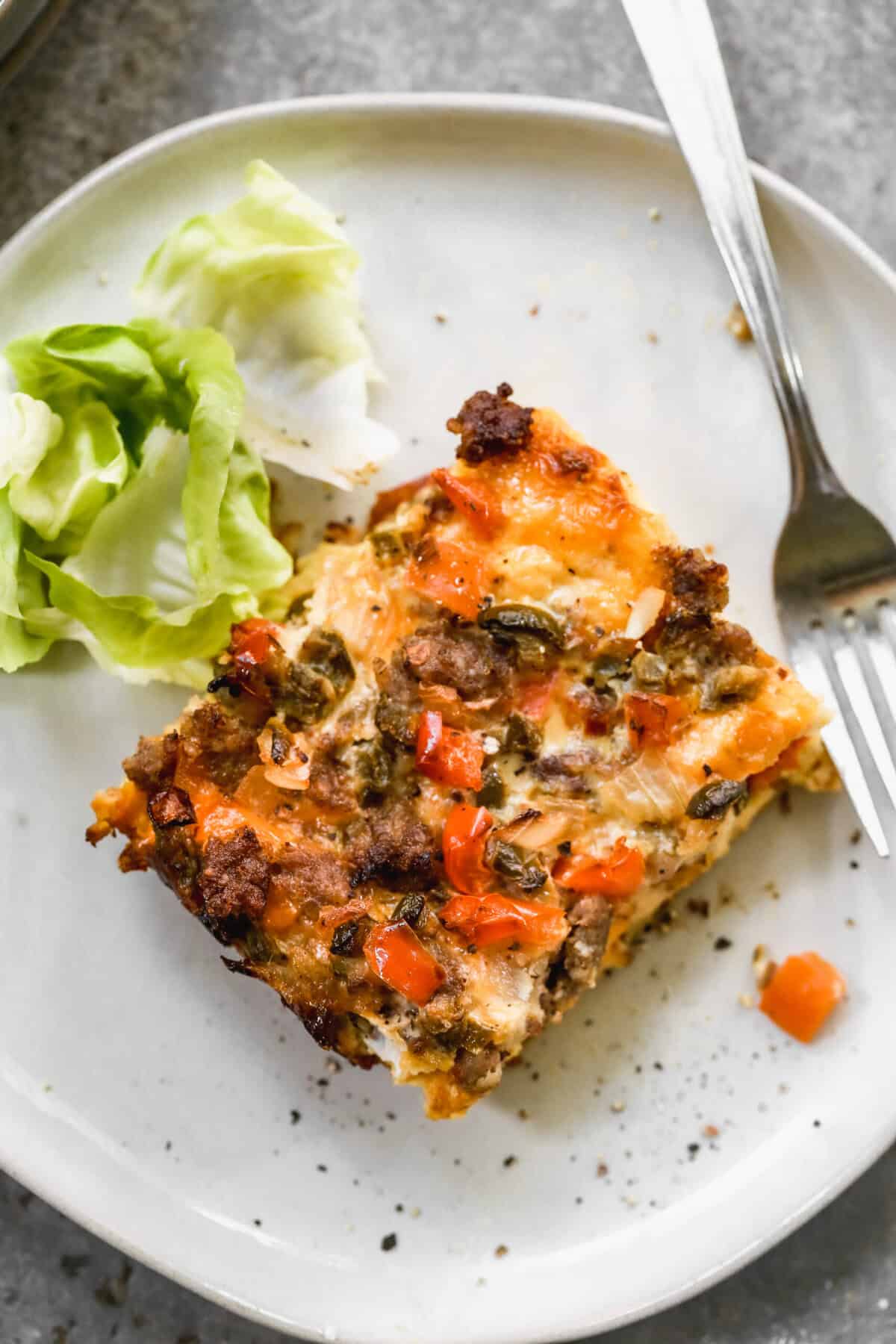 Overnight Sausage and Egg Breakfast Casserole is a prep-ahead dish that takes pressure off busy mornings.