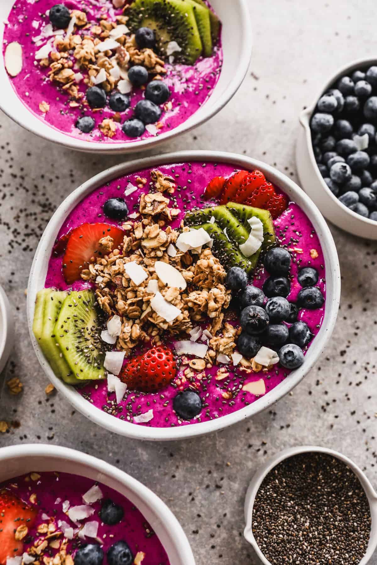 Pitaya Bowls are vibrant smoothie bowls made with frozen fruit for an easy and refreshing breakfast.