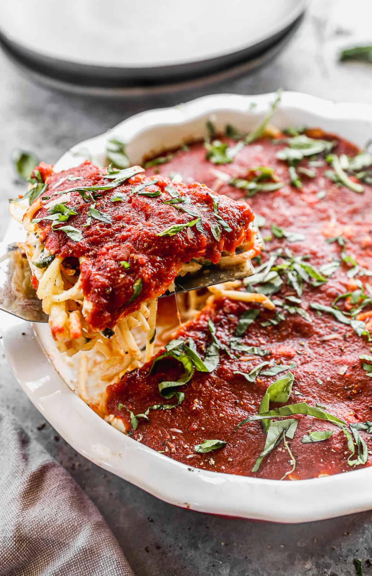 This spaghetti pie recipe turns simple pasta into a hearty, budget friendly baked dinner.