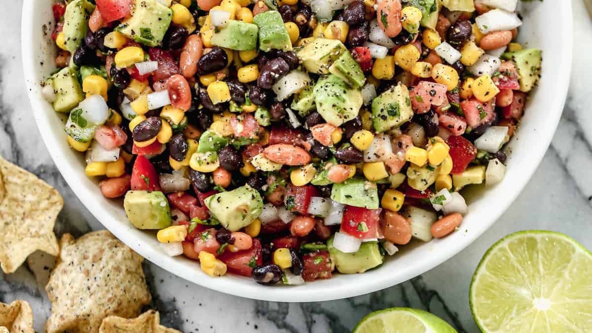 Cowboy Caviar is a great no-cook option that adds crunch and balance to heavier game day snacks.