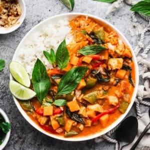 The best Thai Red Curry recipe is creamy, flavorful, and so delicious you will make it every week! It's loaded with veggies and better than takeout!