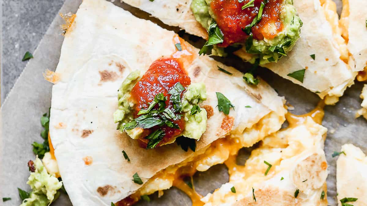 Breakfast Quesadillas are cheesy, make-ahead breakfasts that reheat quickly for busy mornings.