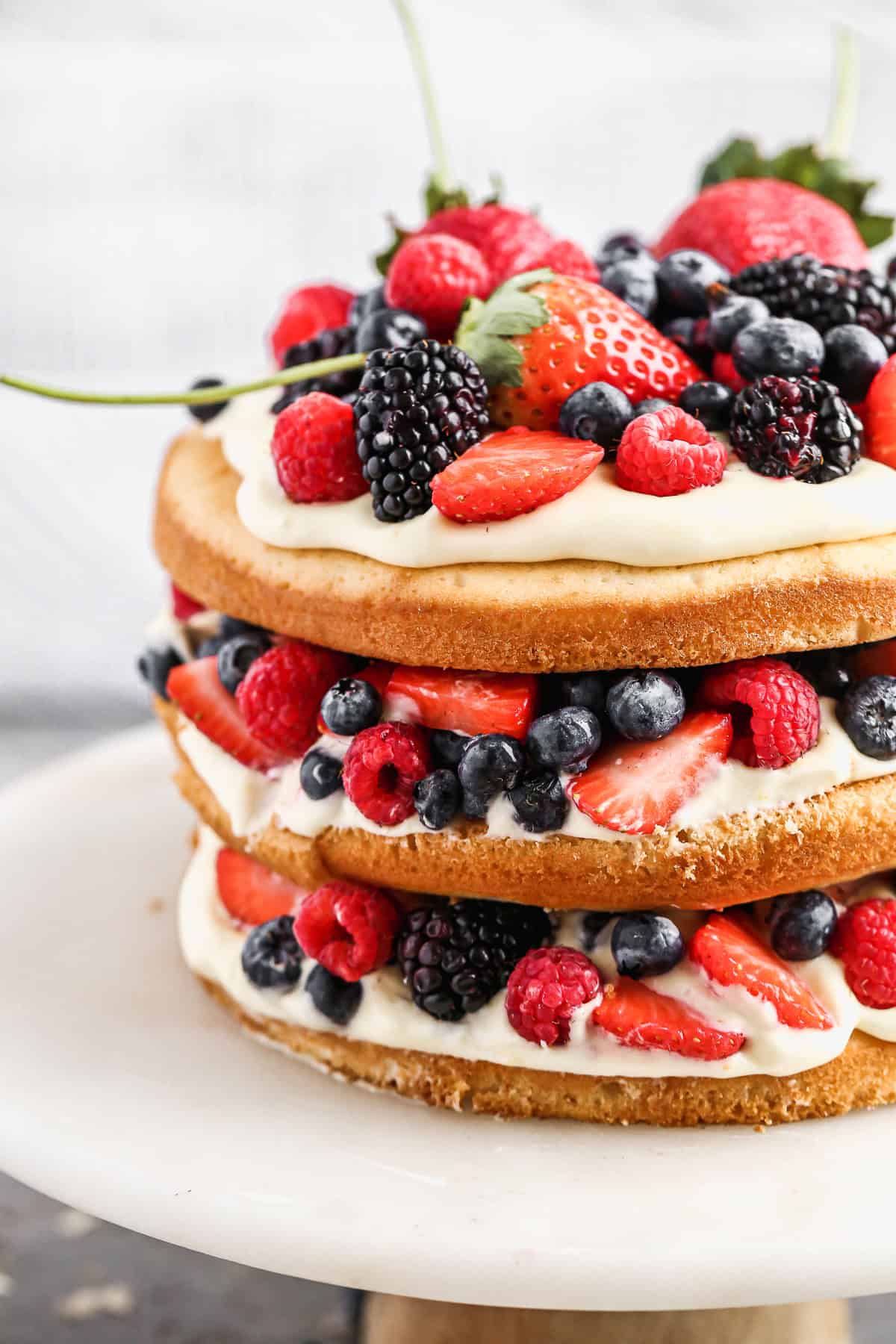 A soft Berry Cake with bright fruit baked in - festive and sweet for your Valentine's table.