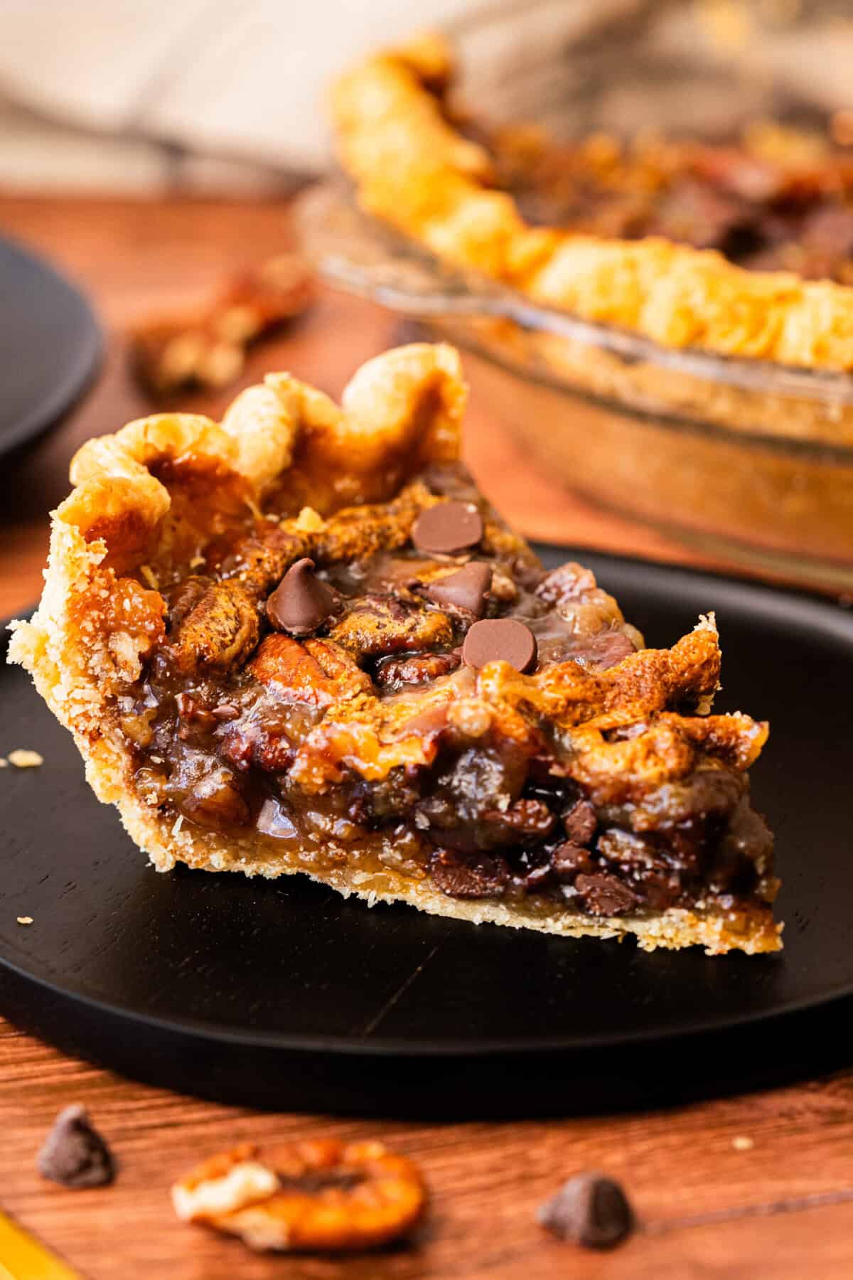 Chocolate Pecan Pie is a rich, gooey showstopper that’s perfect for serving chocolate lovers on Pi Day.