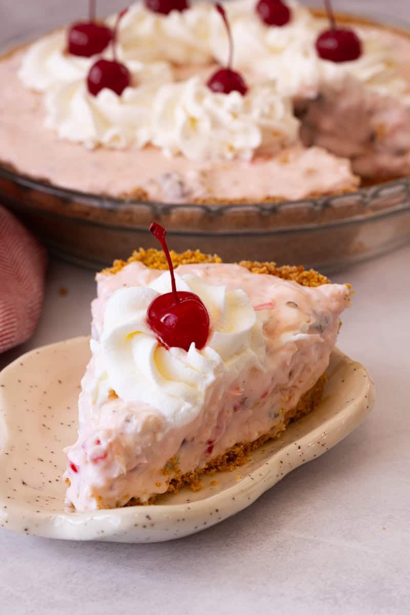 Millionaire Pie is a retro no-bake dessert with a creamy fruit filling in a graham crust.